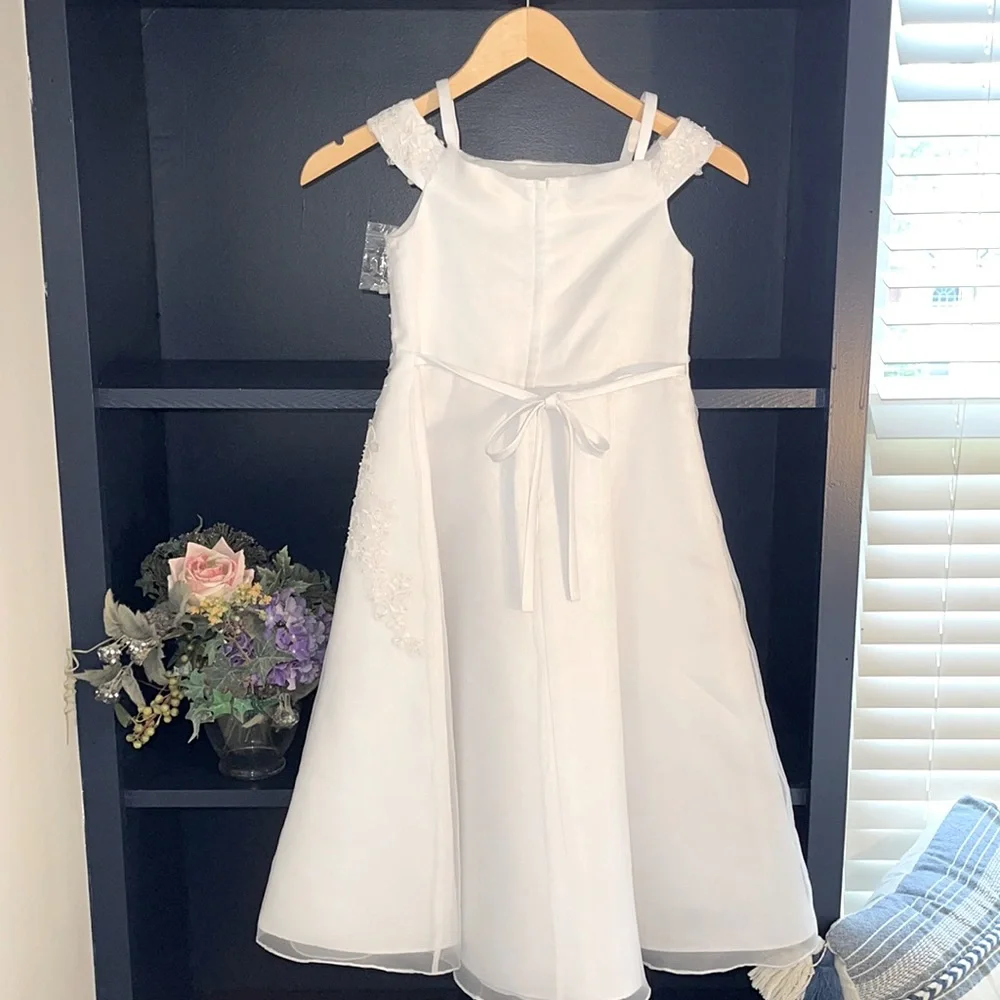 First Communion or flower girl dress. White special occasion dress.